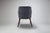 Rear View of Elroy Half Arm Carver Dining Chair In Patterned Fabric